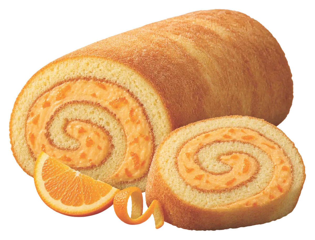 Orange sponge roll with a cut slice beside it, plus an orange segment and peel