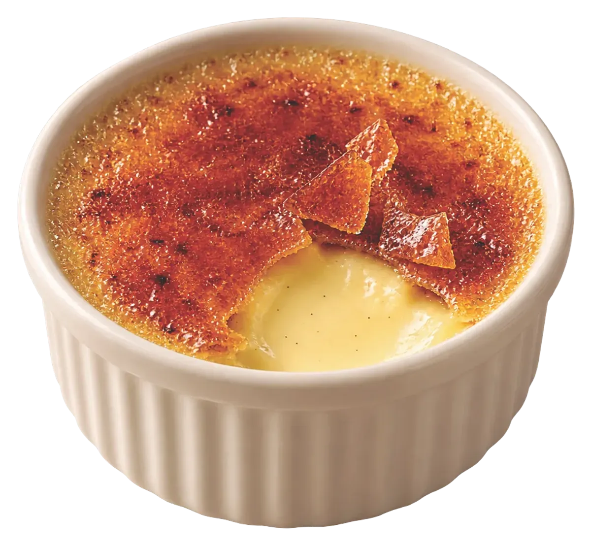 Crème brûlée in a ramekin with its caramelised sugar crust cracked